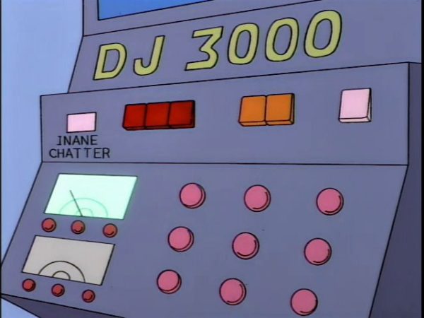 A grey machine with buttons and dials with the words 'DJ 3000' in large yellow letters at the top.